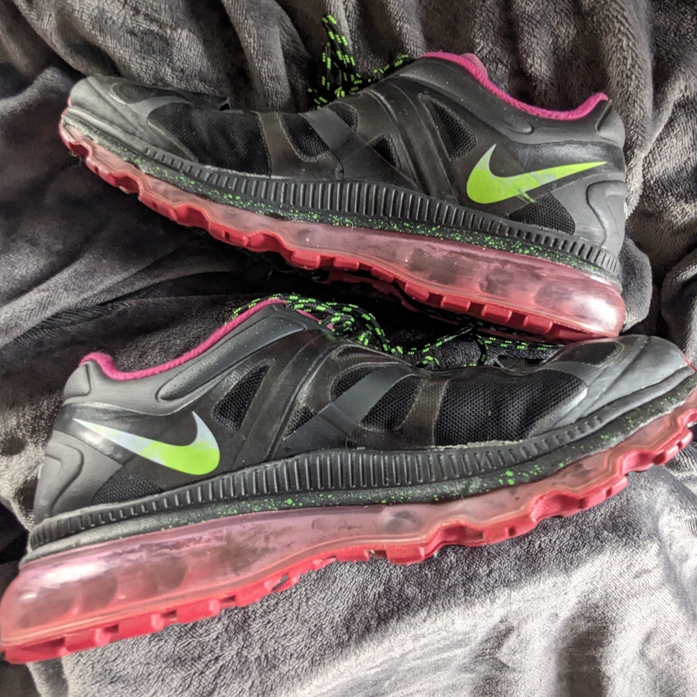 Nike Black Athletic Shoes with Neon Green Swoosh and Pink Accents